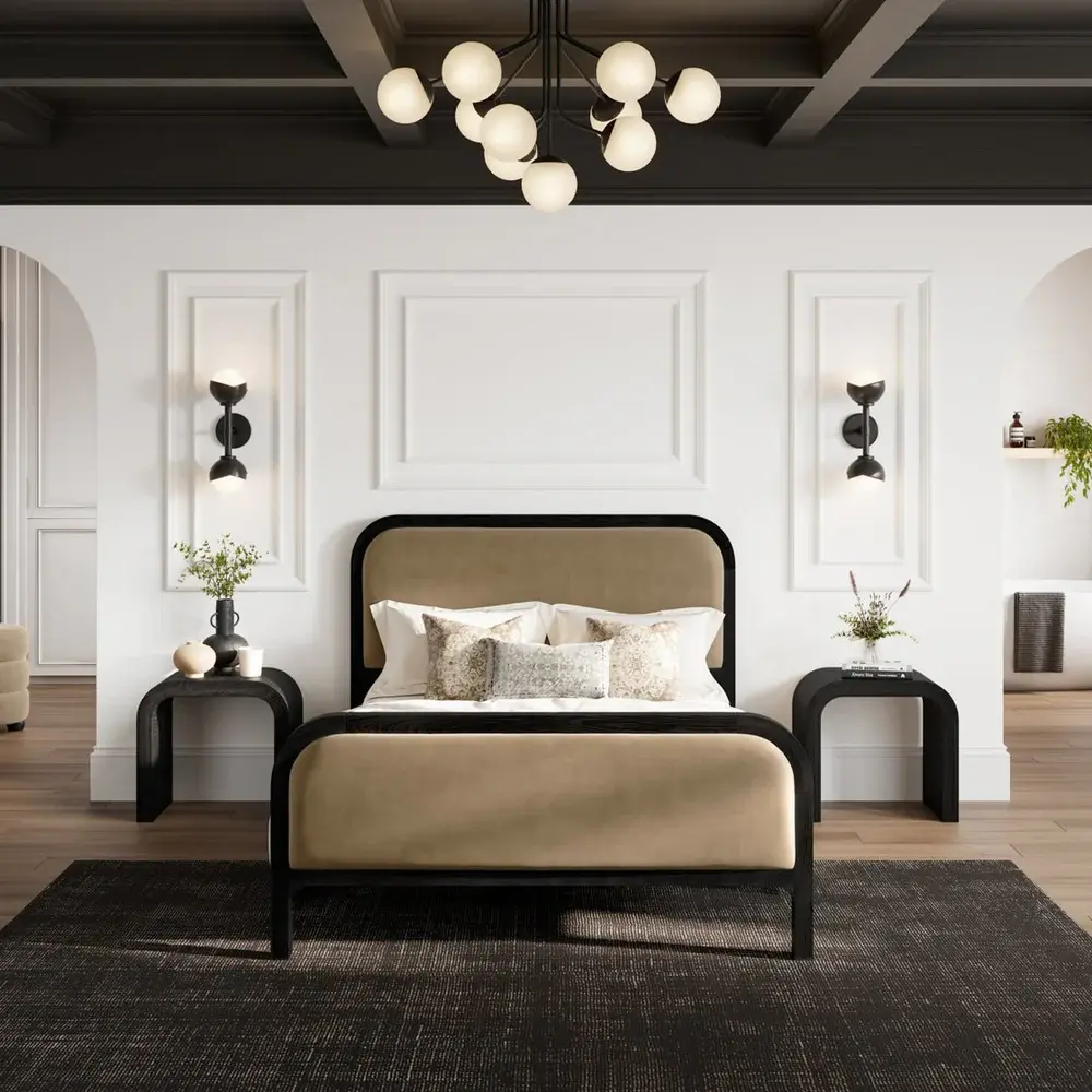 A dressed double bed with quality mattress and linen in a holiday let guest room