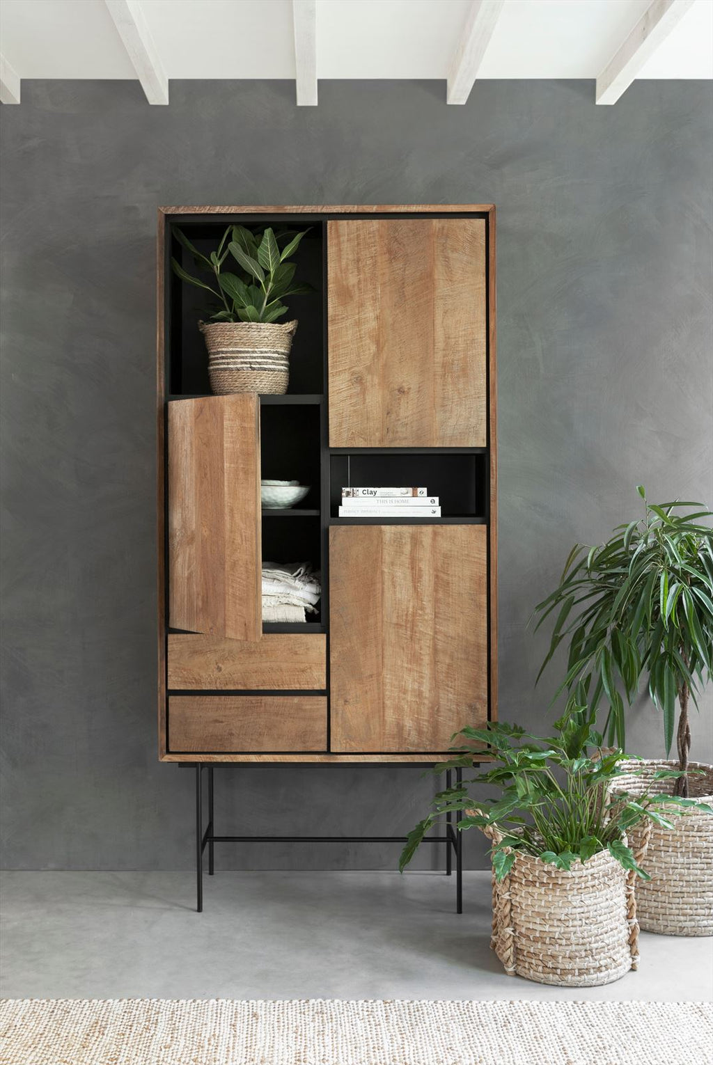 DTP Home Bookcase Metropole high, 3 doors, 2 drawers, 2 open racks in a room setting