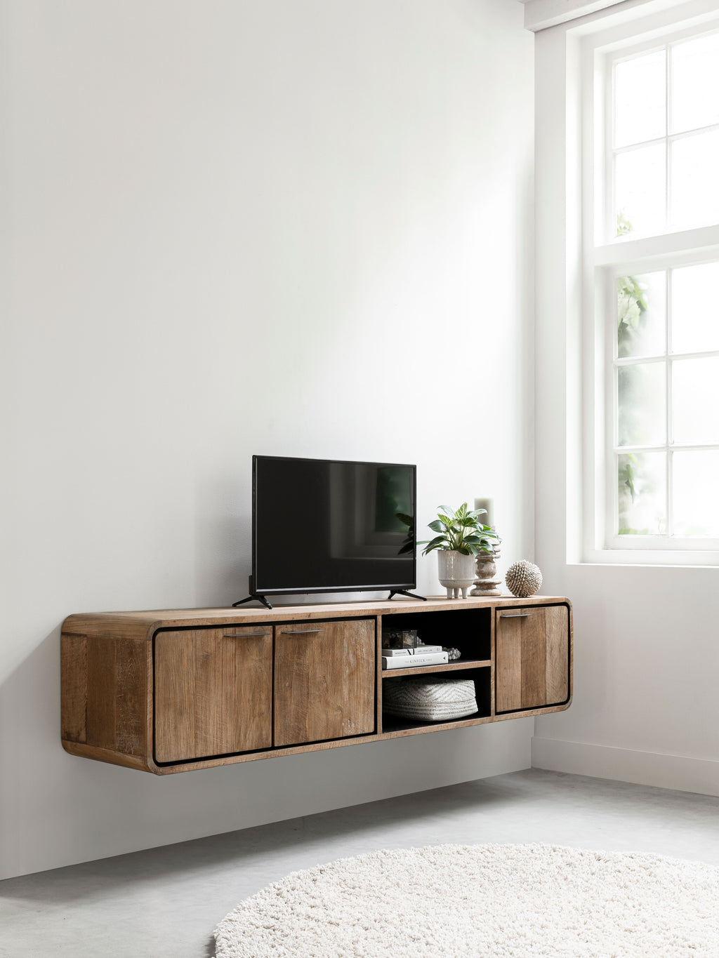 DTP Home Hanging TV stand Evo medium, 3 doors, 2 open racks in a room setting