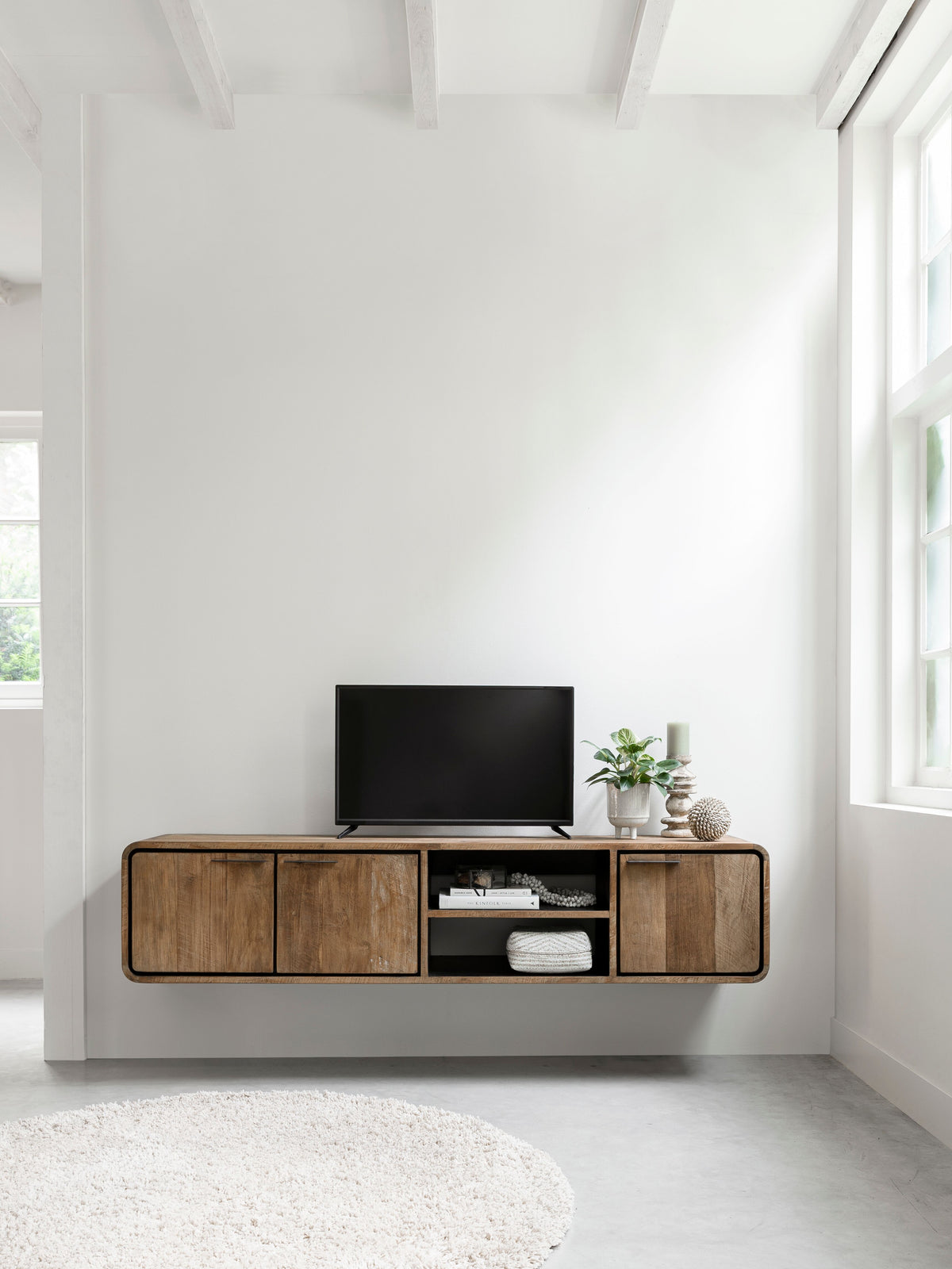 DTP Home Hanging TV stand Evo medium, 3 doors, 2 open racks in a room setting