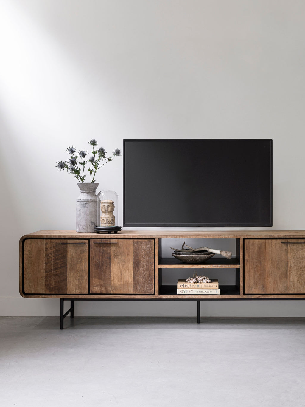 DTP Home TV stand Evo large, 4 doors, 2 open racks in a room setting